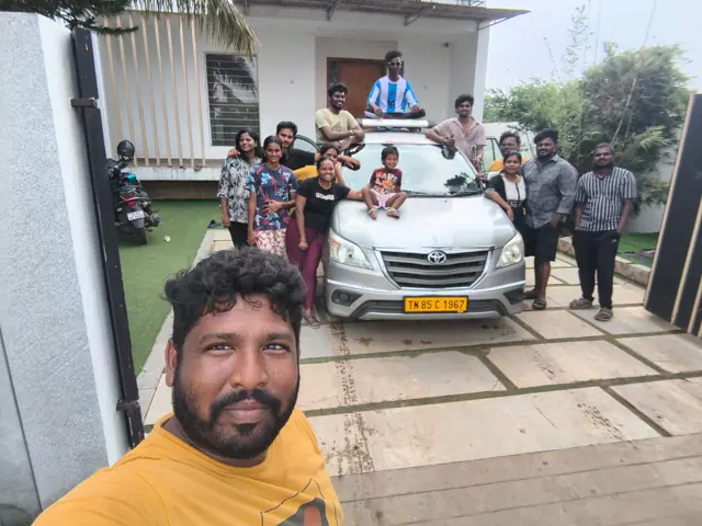 Family group with their Carzon Rentals Innova before a trip from Chennai