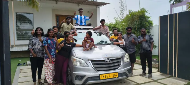 Group of travellers with a Carzon Rentals Innova in Chennai