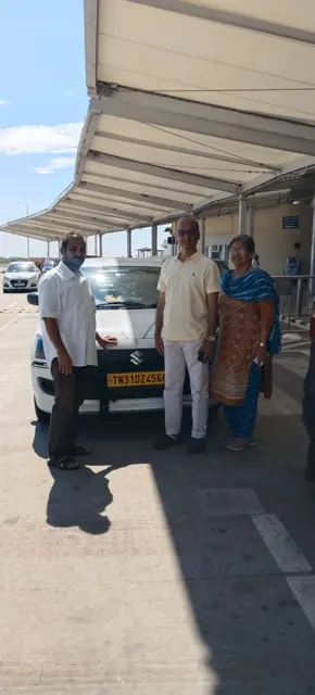 Customers at pickup with their Innova Crysta and driver in Chennai