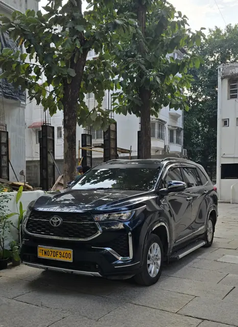 Black Toyota Innova Hycross available for rent in Chennai with driver