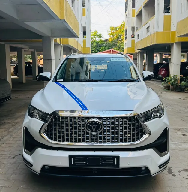 White Toyota Innova Hycross rental in Chennai with driver, front view